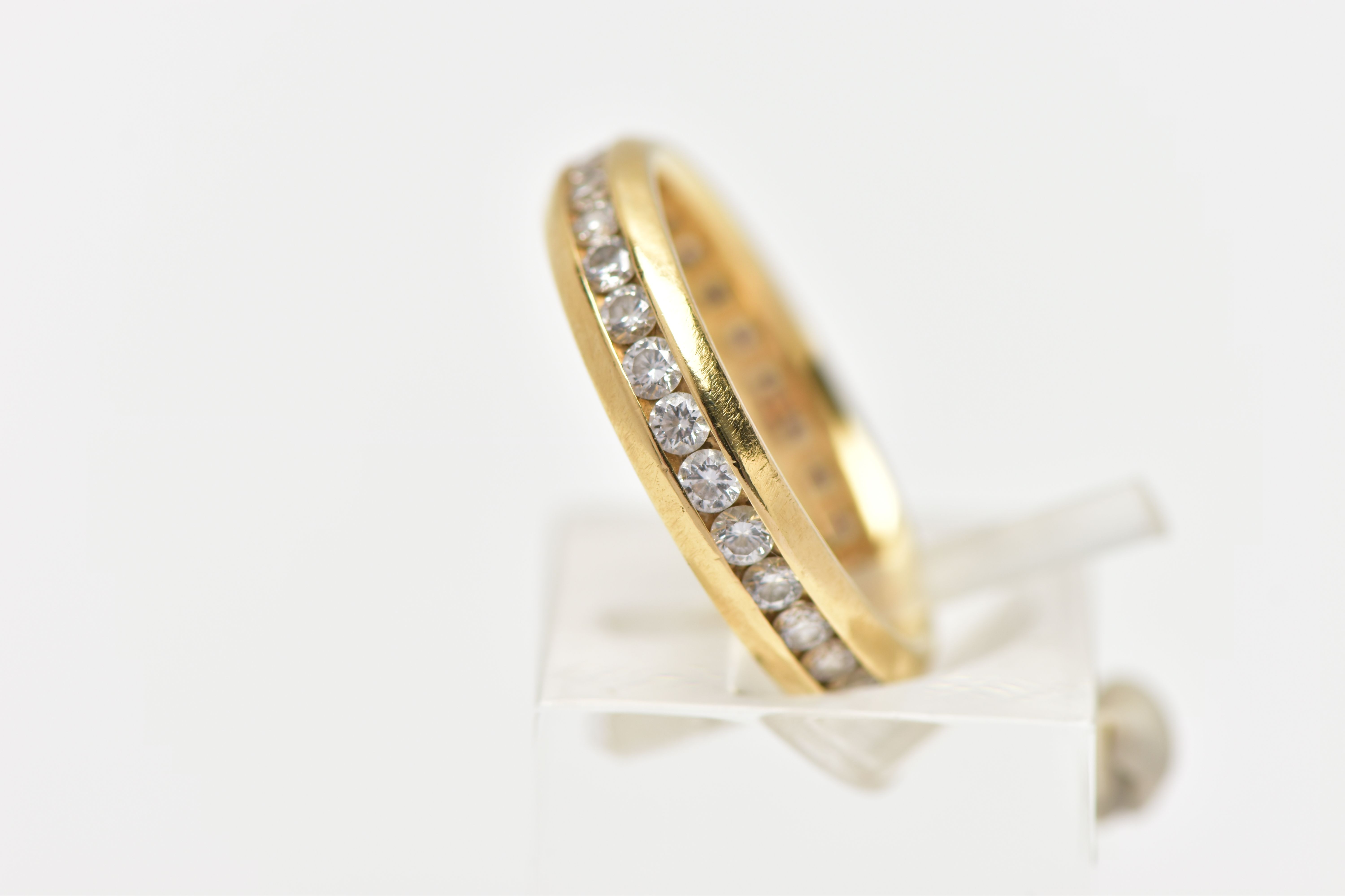 AN 18CT GOLD, FULL DIAMOND ETERNITY BAND, designed with a row of channel set, round brilliant cut - Image 2 of 4
