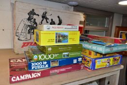 GAMES & JIGSAW PUZZLES, comprising five jigsaw Puzzles (contents un-checked) a balsa model