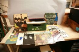 A TRAY CONTAINING LPs AND BOOKS OF AND BY THE BEATLES including Help ( 1st pressing), With The