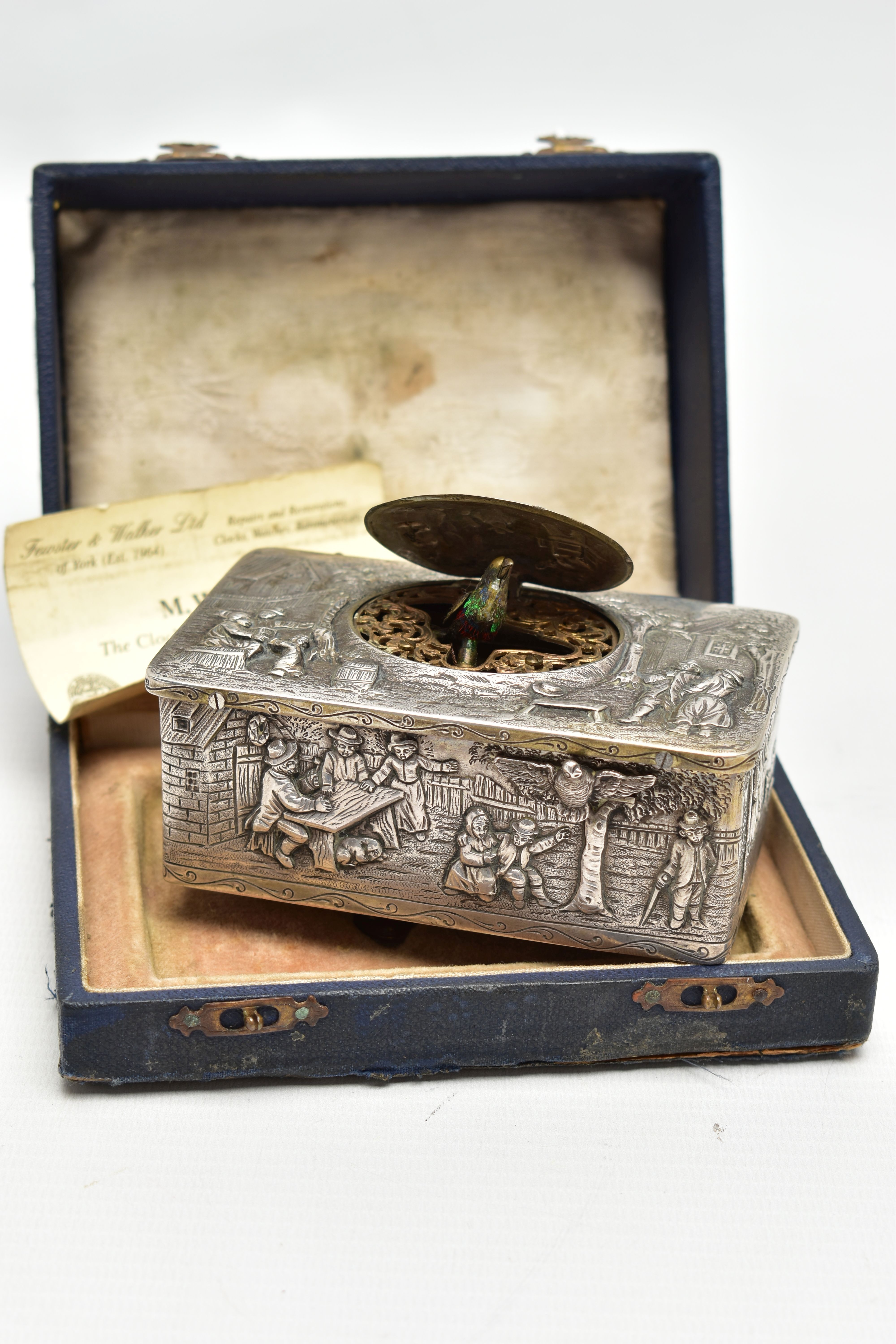 A 19TH CENTURY MUSICAL BIRD BOX, of a rectangular form, the box decorated with figural scenes such