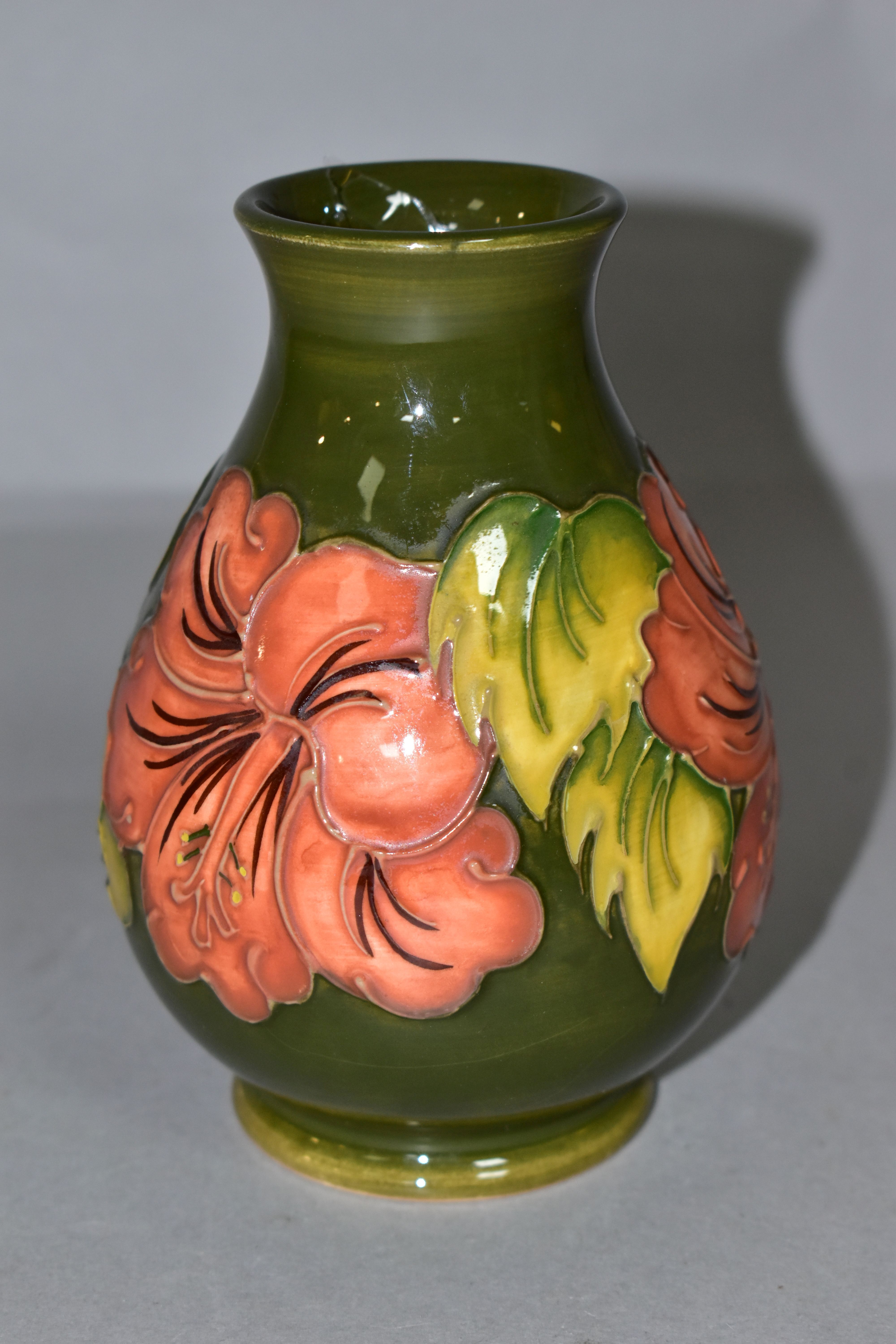 A MOORCROFT POTTERY BALUSTER VASE DECORATED WITH CORAL HIBISCUS ON A GREEN GROUND, impressed marks - Image 2 of 5