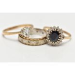 TWO 9CT GOLD RINGS AND A YELLOW AND WHITE METAL RING, the first an oval cut sapphire set with a