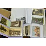 POSTCARDS, three albums containing approximately 420 postcards and photographs dating from the early