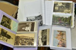 POSTCARDS, three albums containing approximately 420 postcards and photographs dating from the early