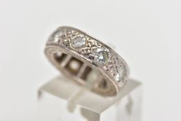 A WHITE METAL DIAMOND FULL ETERNITY RING, comprising a series of brilliant cut diamonds with