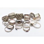 A SELECTION OF WHITE METAL RINGS, to include a Pandora enamel and split pearl floral dress ring, a