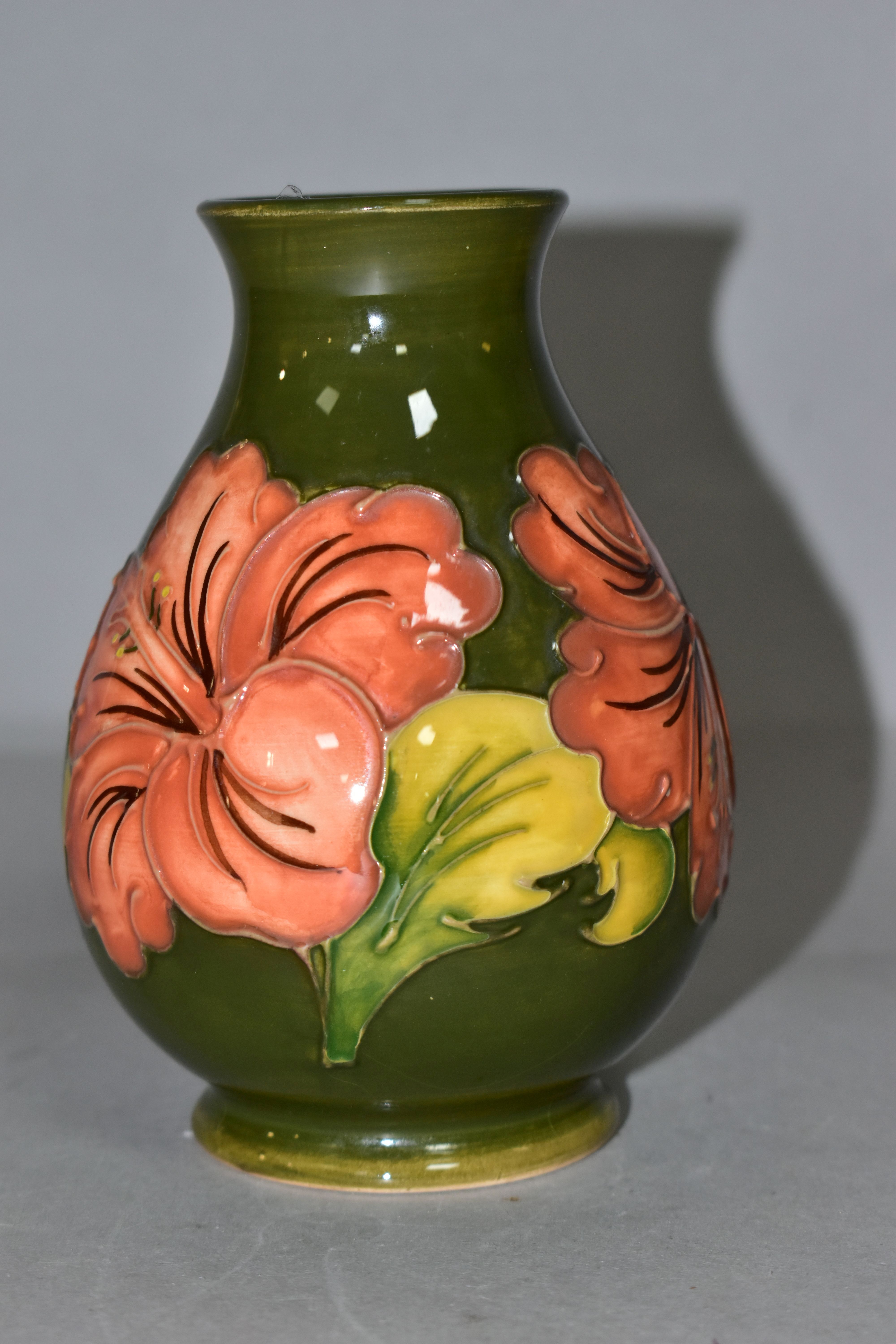 A MOORCROFT POTTERY BALUSTER VASE DECORATED WITH CORAL HIBISCUS ON A GREEN GROUND, impressed marks - Image 3 of 5