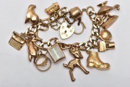 A 9CT GOLD CHARM BRACELET, a flat curb link bracelet, fitted with a heart padlock clasp,