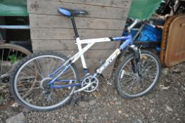 A BLUE/BLACK AND WHITE GT AGGRESSOR TRIPLE TRIANGLE GENTLEMANS BICYCLE, with a 20 frame, Shimano