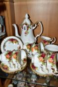 A ROYAL ALBERT OLD COUNTRY ROSES PATTERN FIFTEEN PIECE COFFEE SERVICE AND AN ASHTRAY, the coffee set