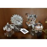 THREE SWAROVSKI CRYSTAL ANIMALS AND A PUFFER FISH, the animals comprising a hedgehog, length 7cm,