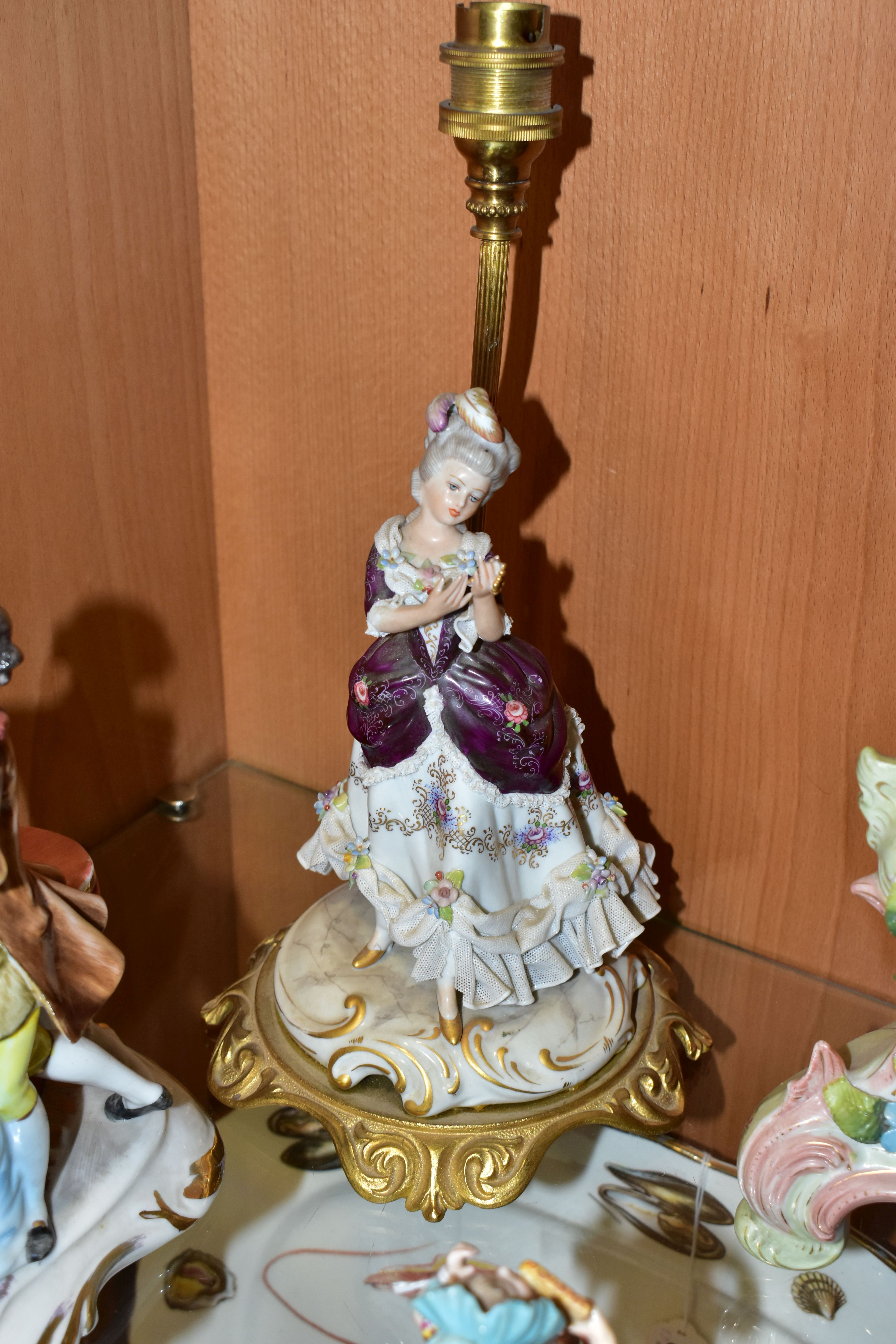 A LATE 19TH CENTURY CONTINENTAL PORCELAIN FLORAL ENCRUSTED MANTEL CLOCK, A FIGURAL TABLE LAMP AND - Image 6 of 13