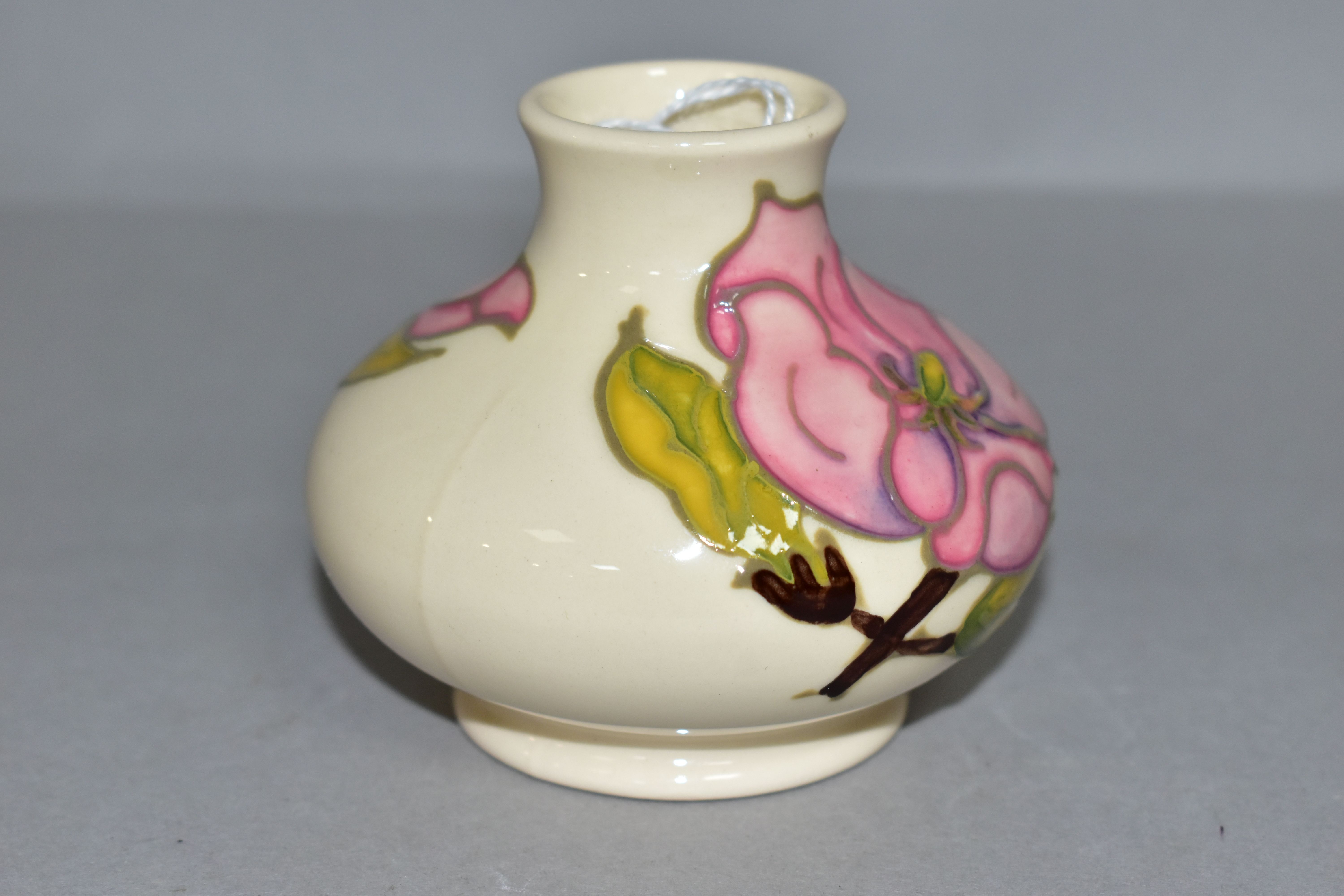 A MOORCROFT POTTERY SQUAT BALUSTER VASE DECORATED WITH PINK MAGNOLIA ON A CREAM GROUND, bears gilt - Image 2 of 4