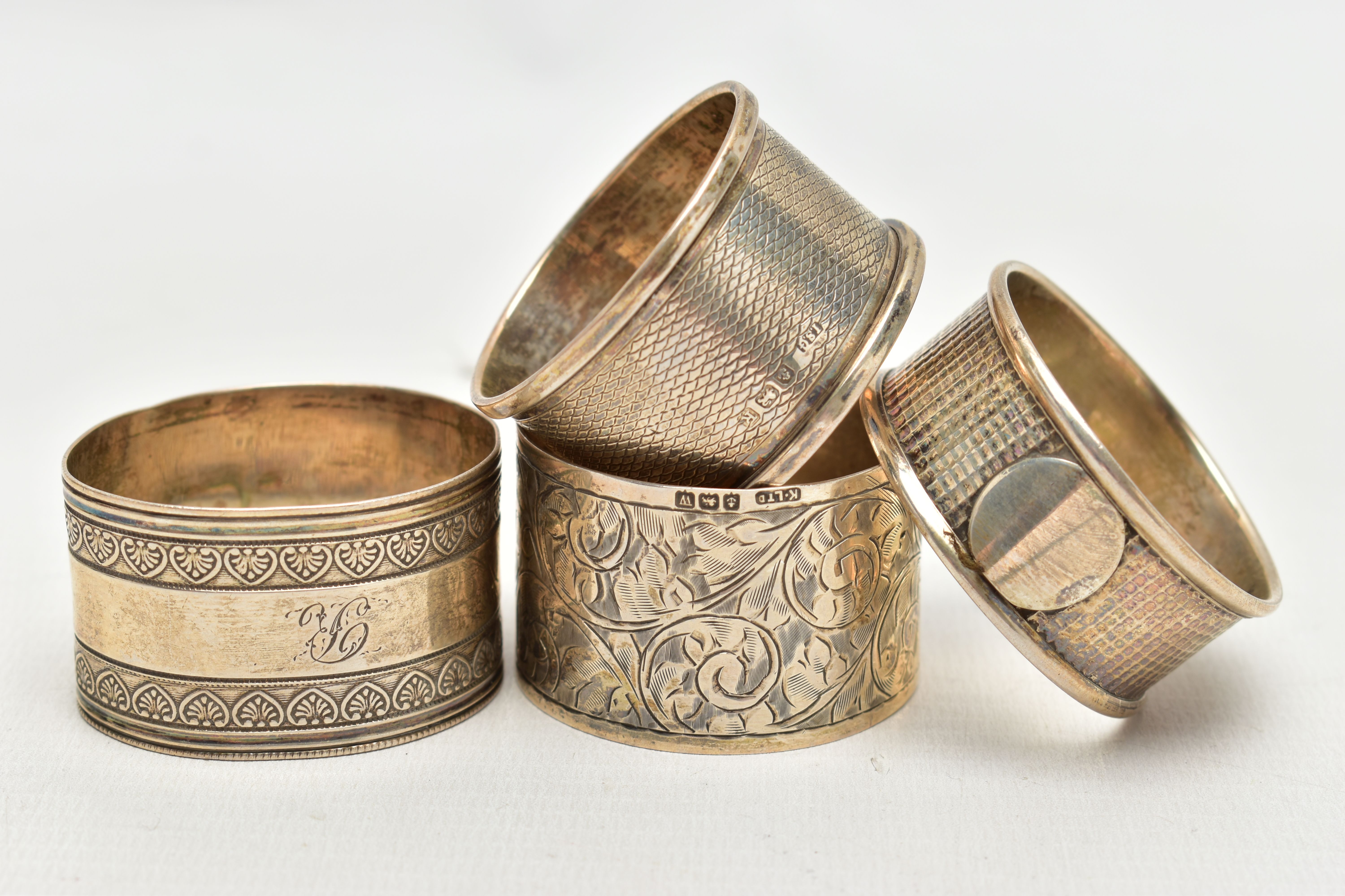 A SELECTION OF FOUR SILVER NAPKIN RINGS, to include an early 20th century Charles Horner napkin ring - Image 2 of 3