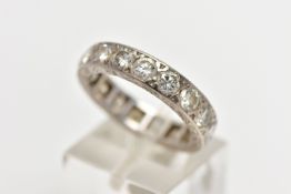 A DIAMOND ETERNITY BAND RING, a full eternity ring set with nineteen round brilliant cut diamonds,