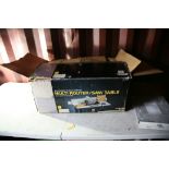 A PERFOMANCE MULTI ROUTER/SAW TABLE in damaged box