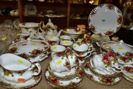 A ROYAL ALBERT 'OLD COUNTRY ROSES' PATTERN DINNER SET, comprising two circular twin handled