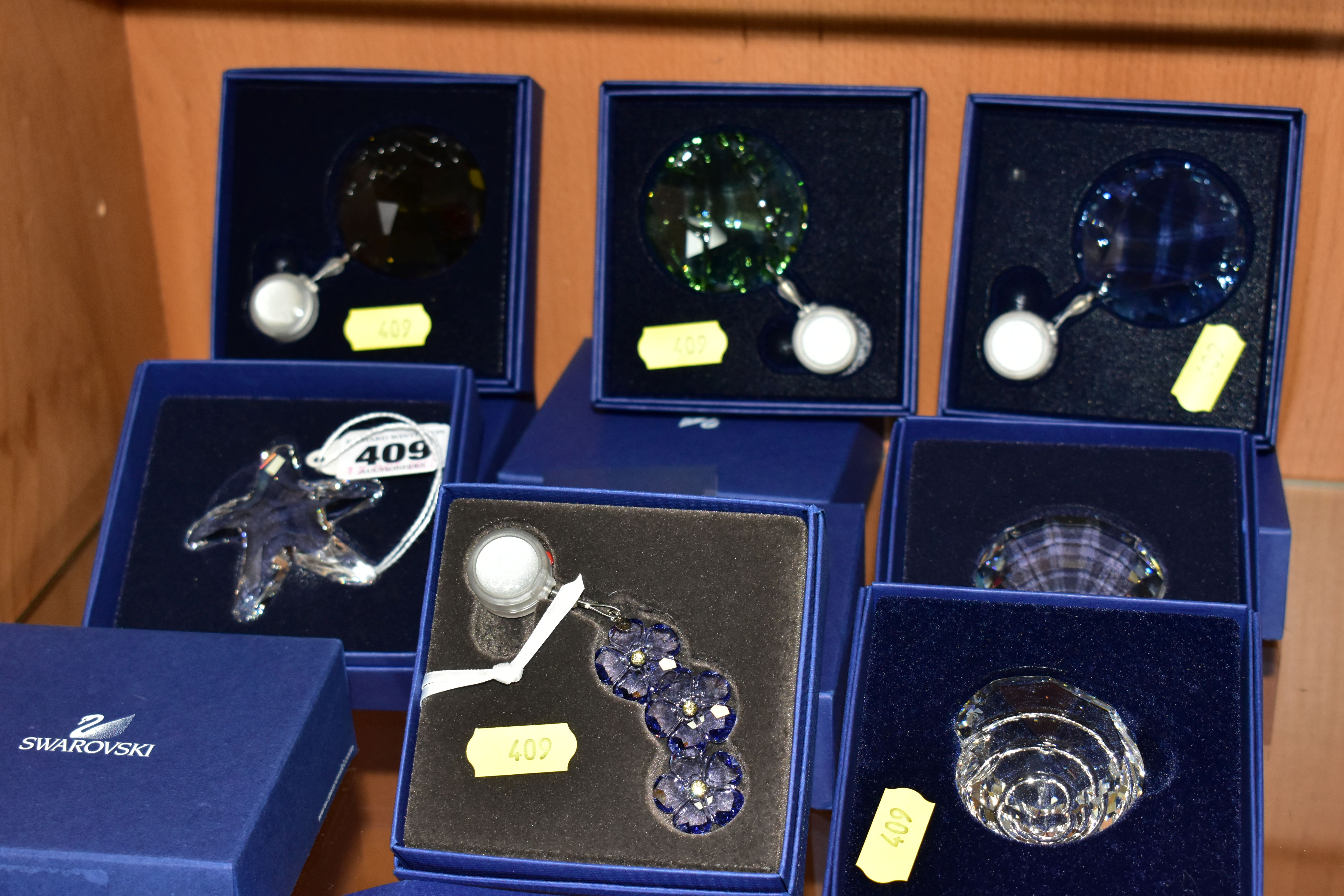 SEVEN BOXED SWAROVSKI COLLECTORS/CRYSTAL SOCIETY ANNUAL RENEWAL GIFTS, comprising three from Wonders