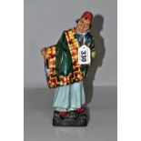 A ROYAL DOULTON CARPET SELLER FIGURINE, HN1464, height 22.5cm, printed and impressed marks to