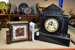 TWO MANTEL CLOCKS BOTH WITH KEYS AND PENDULUMS, comprising an Art Deco style wooden and chrome cased