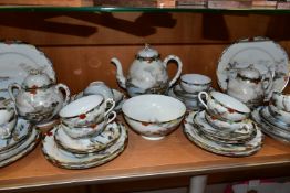 AN EARLY 20TH CENTURY JAPANESE EGGSHELL PORCELAIN FORTY PIECE TEA SERVICE, decorated with