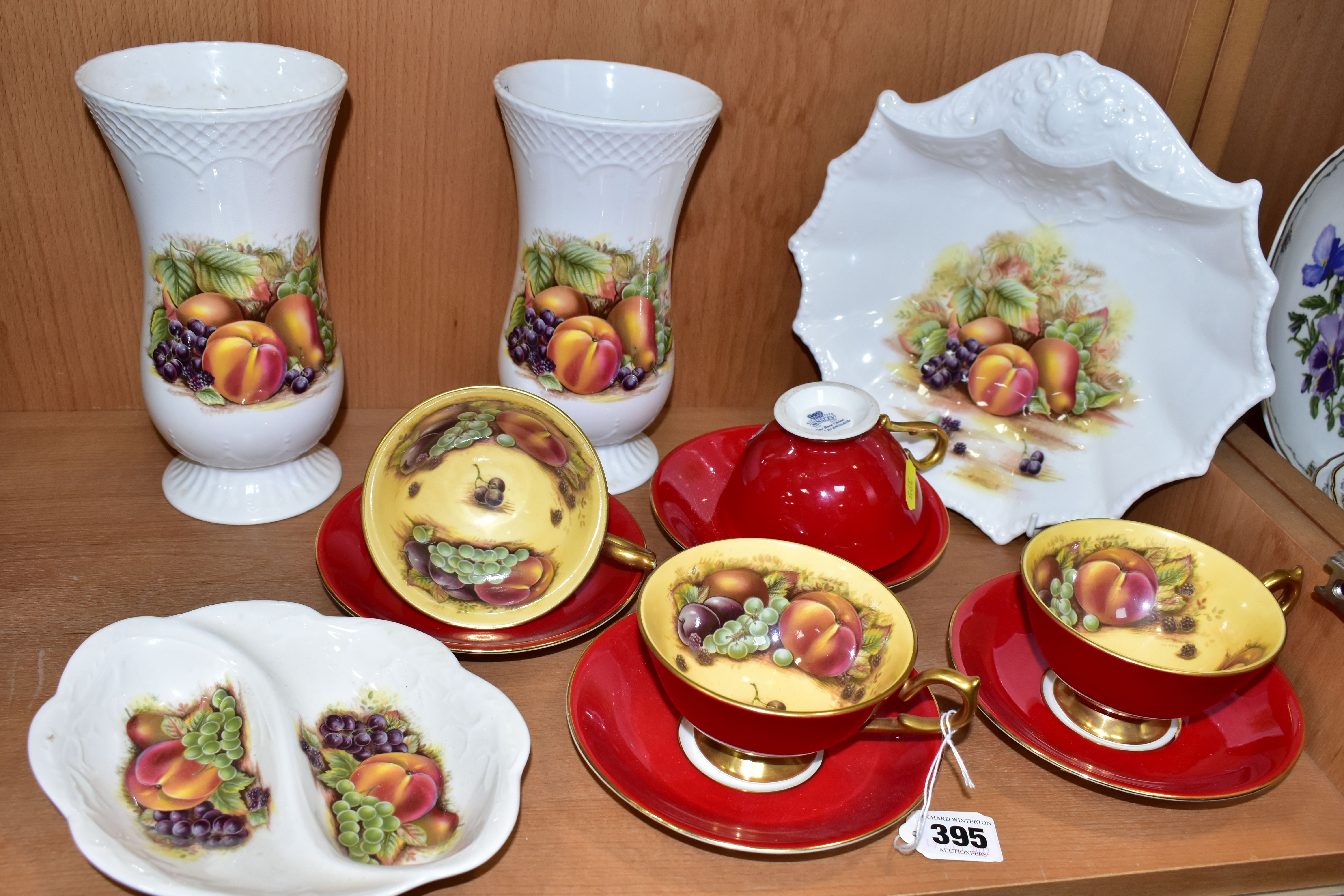 A GROUP OF AYNSLEY ORCHARD GOLD TEA AND GIFT WARES, comprising four cabinet cups and saucers, the