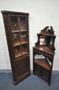 AN EDWARDIAN MAHOGANY CORNER CUPBOARD, with foliate and scrolled pediment, two beveled mirrors,