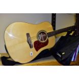 AN ARIA ACOUSTIC GUITAR, MUSIC STAND AND MUSIC BOOKS, the Aria guitar, model number AW-55, with soft