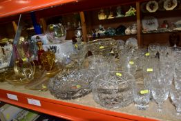 A QUANTITY OF CUT CRYSTAL AND COLOURED GLASSWARE, comprising three large fruit bowls (one has