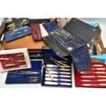 A LARGE ASSORTMENT OF BOXED CANTEENS AND CUTLERY SETS, MATHEMATICAL ITEMS, FLASK AND VANITY SET,