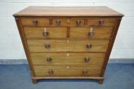 A GEORGE III WALNUT CHEST OF DRAWERS, with an unusual configuration of three small drawers, above