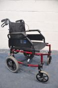 A RASCAL 135 WHEELCHAIR assistant propelled/push along wheelchair with brakes (in good used