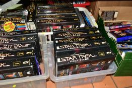A QUANTITY OF ASSORTED STAR TREK BOOKS AND MAGAZINES, to include several binders of the Official