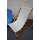 A FOLDING PINE DECK CHAIR, and a metal framed folding sun lounger (condition:-good condition) (2)