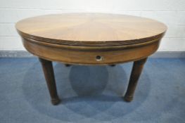 A SEILER LIEGNITZER RINGTISCH CIRCULAR OAK DINING TABLE, c1920, with extending leaves that open with