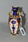 A ROYAL CROWN DERBY OLD IMARI 1128 TWIN HANDLED VASE, of baluster form with gilt foliate handles,