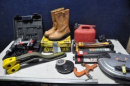 A SELECTION OF MISCELLANEOUS to include three steering locks, petrol can, two pairs of steel toe cap