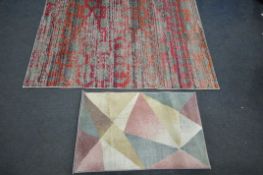 A RECTANGULAR CASA COLLECTION RUG, length 170cm x width 120cm, and a smaller rug (good condition) (