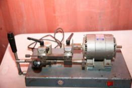 A VINTAGE KEY CUTTER MACHINE with a Parvalux 240v motor (untested)