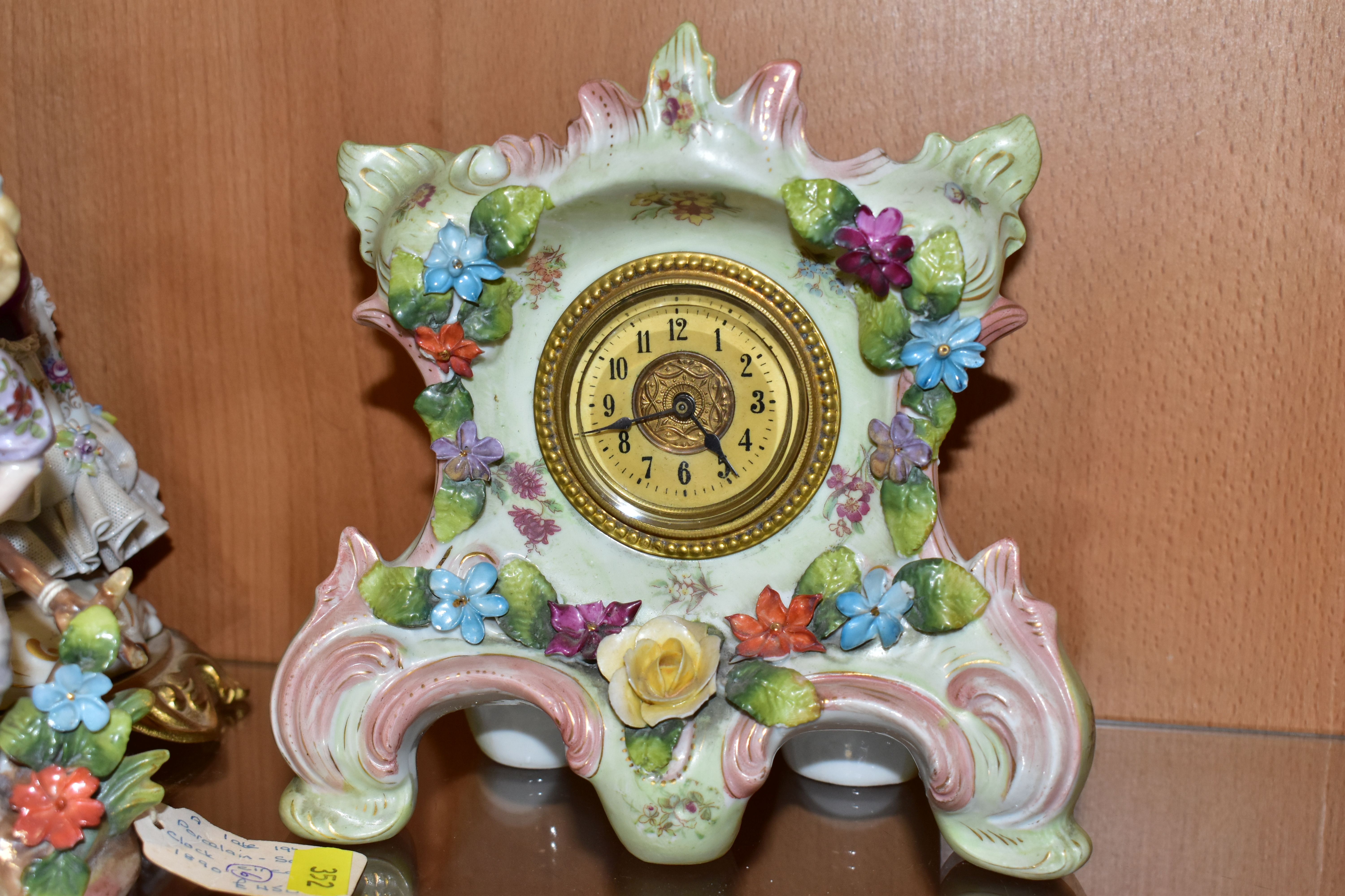 A LATE 19TH CENTURY CONTINENTAL PORCELAIN FLORAL ENCRUSTED MANTEL CLOCK, A FIGURAL TABLE LAMP AND - Image 11 of 13
