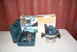A BOXED ROUYER TABLE, a Performance Pro 1/4in router and a Black and Decker Detail Sander (3) (all