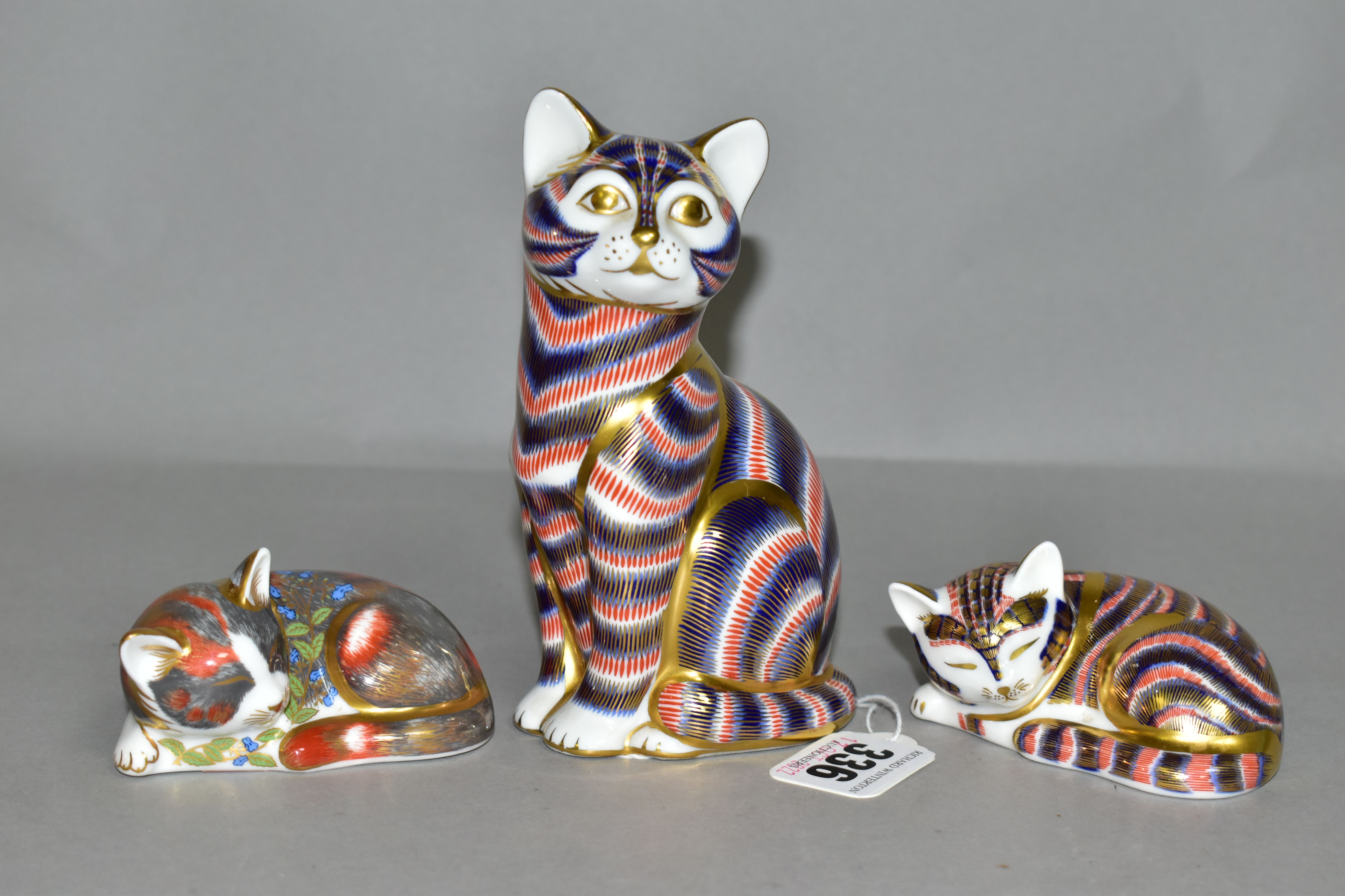 THREE ROYAL CROWN DERBY PAPERWEIGHTS, comprising Cat, a second with silver stopper, a Catnip Kitten,