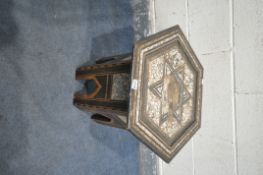 A HEXAGONAL MOTHER OF PEARL INLAID TABLE, diameter 56cm x height 51cm (condition - ideal for