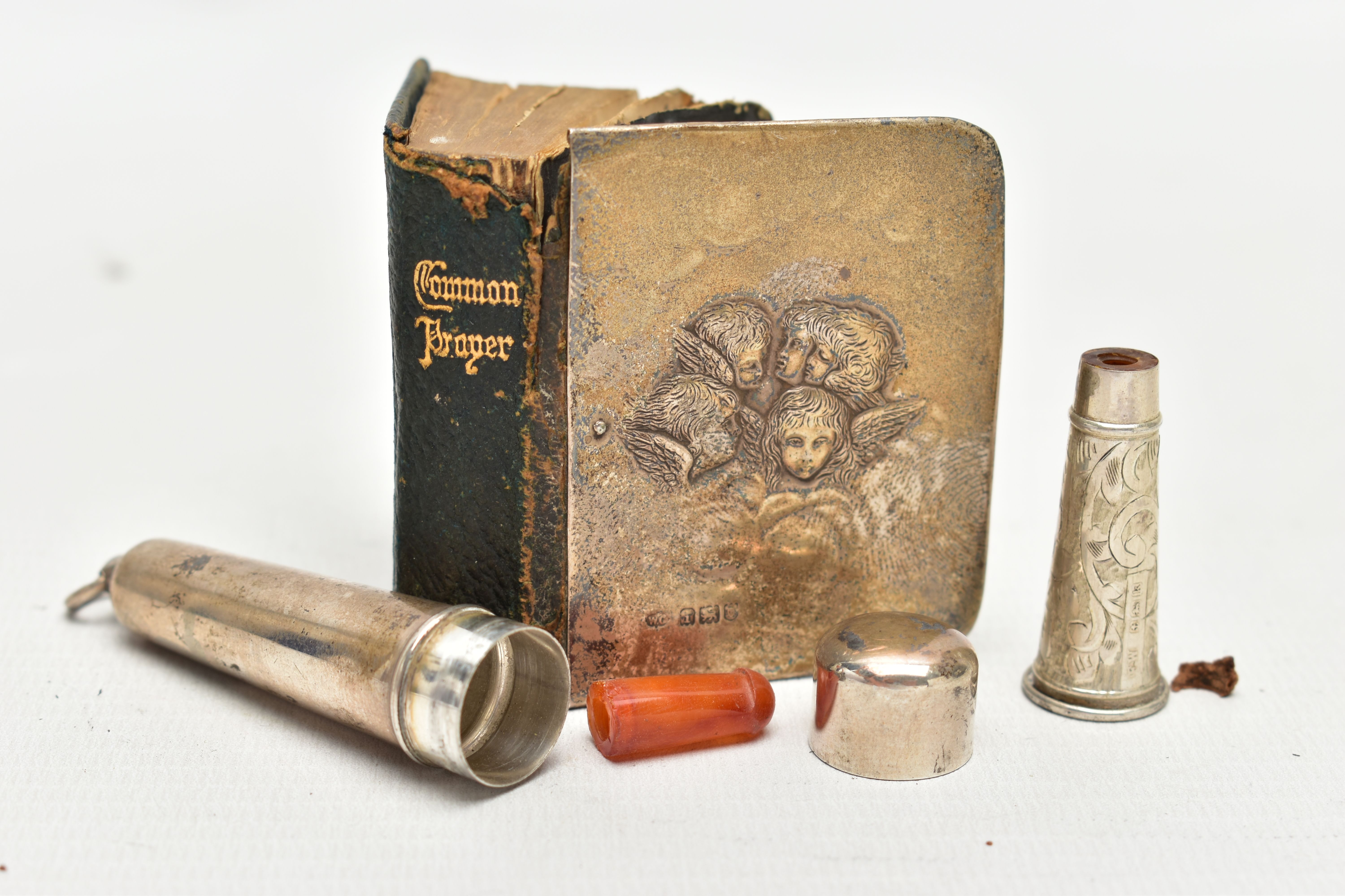 A SILVER PRAYER BOOK AND CIGAR HOLDER, the book with silver front panel depicting five Cherubs, - Image 4 of 4