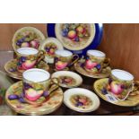 A GROUP OF AYNSLEY ORCHARD GOLD COFFEE WARES, comprising a 21cm plate, five coffee cans, seven