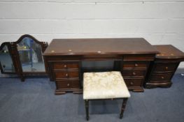 A MAHOGANY DRESSING DESK, with a triple beveled mirror, and an assortment of nine drawers, width