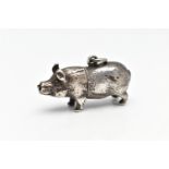 A MINIATURE WHITE METAL NOVELTY PENCIL, in the form of a small pig, integrated pencil holder, fitted