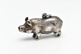 A MINIATURE WHITE METAL NOVELTY PENCIL, in the form of a small pig, integrated pencil holder, fitted