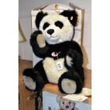 A BOXED STEIFF 'PANDA TED', black and white acrylic mix, jointed, yellow label, model no.010637,