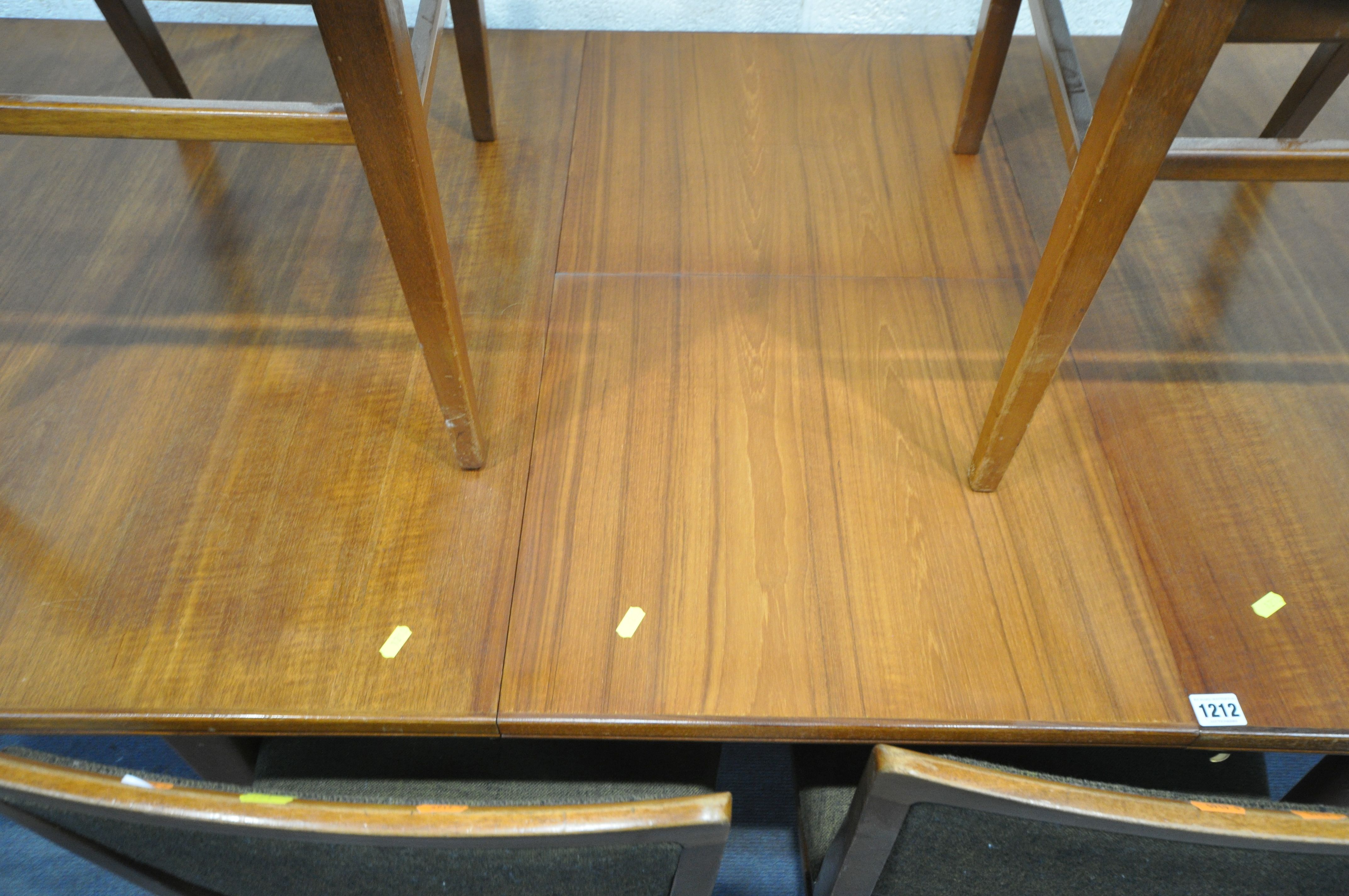 A MID CENTURY TEAK EXTENDING DINING TABLE, on tapering legs, open length 228cm x closed length 181cm - Image 3 of 3